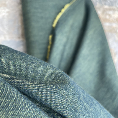 close up of denim chambray green and yellow
