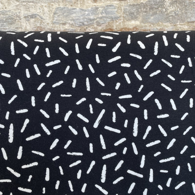 Graphic Dashes Jersey Fabric in Black and White By Poppy